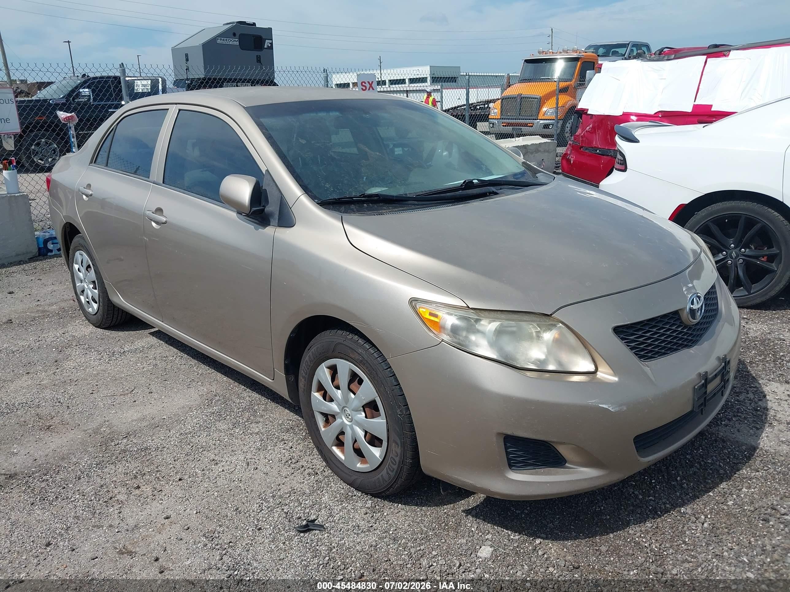 2009 Toyota Corolla Le Gold vin: 1NXBU40E89Z061159