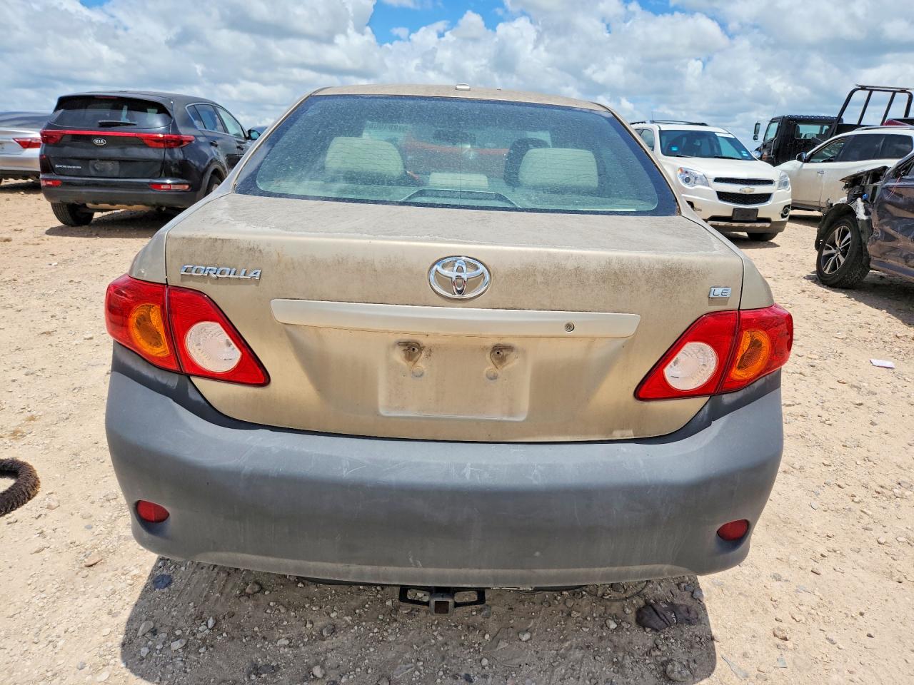 2009 Toyota Corolla Le Gold vin: 1NXBU40E89Z077507