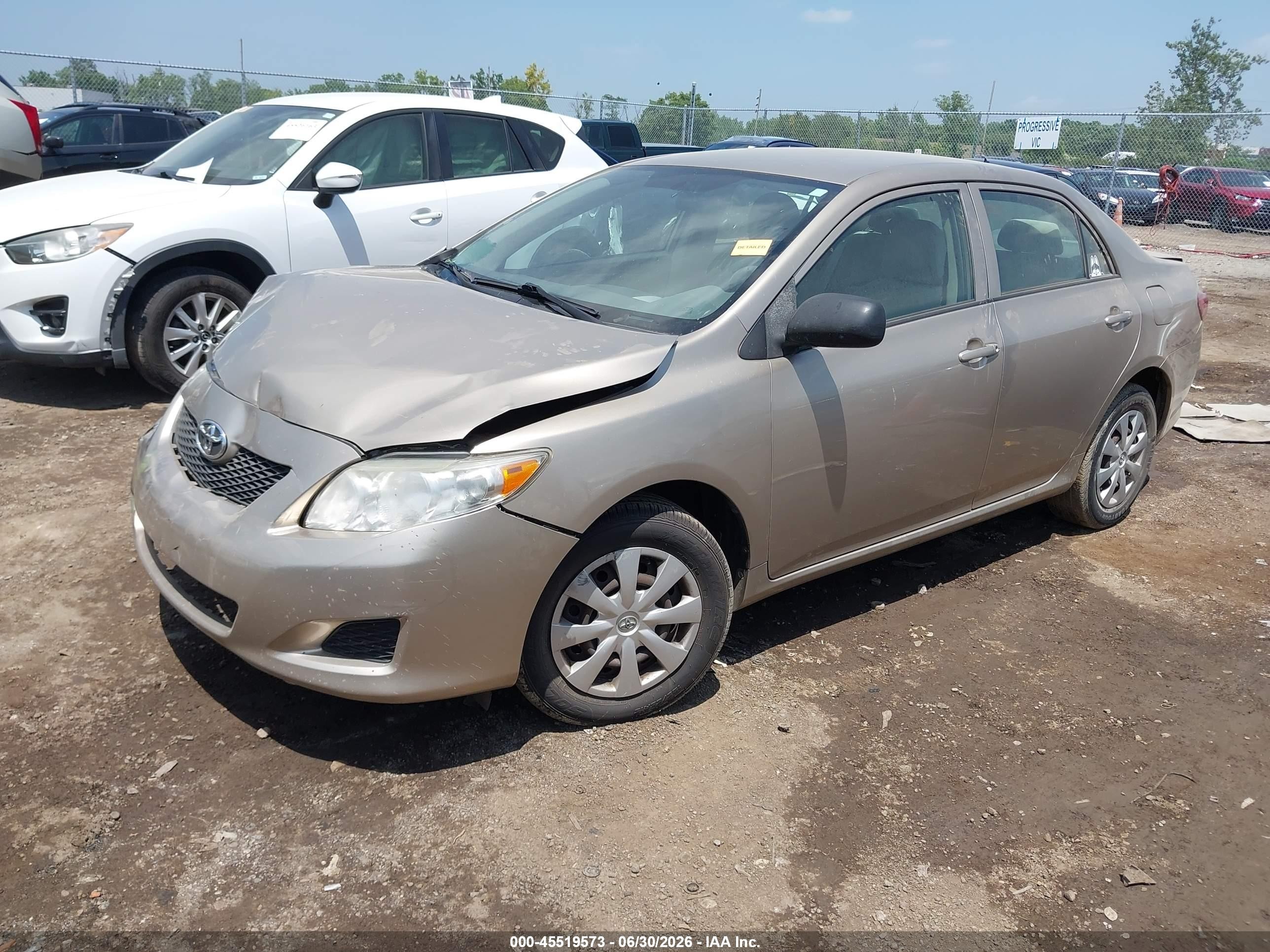 2009 Toyota Corolla   Tan vin: 1NXBU40E99Z033614