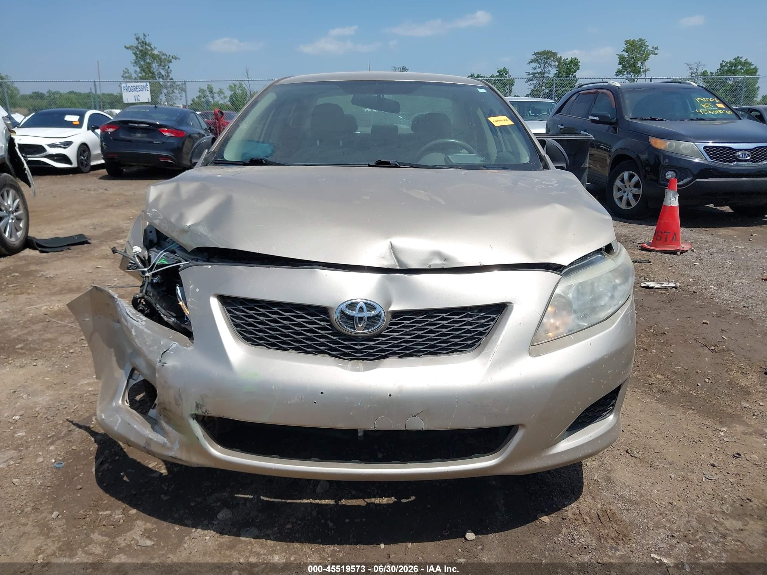 2009 Toyota Corolla   Tan vin: 1NXBU40E99Z033614