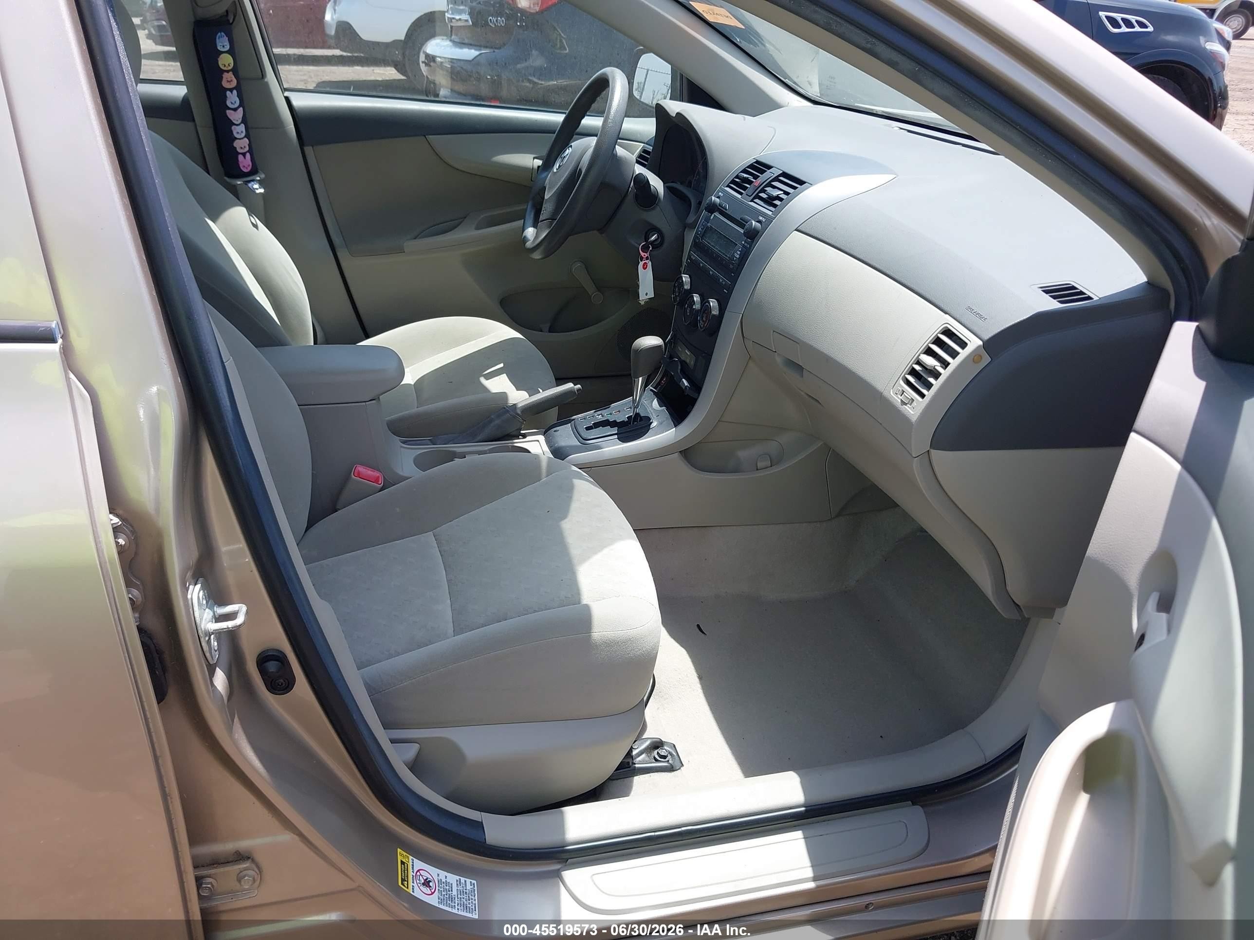 2009 Toyota Corolla   Tan vin: 1NXBU40E99Z033614