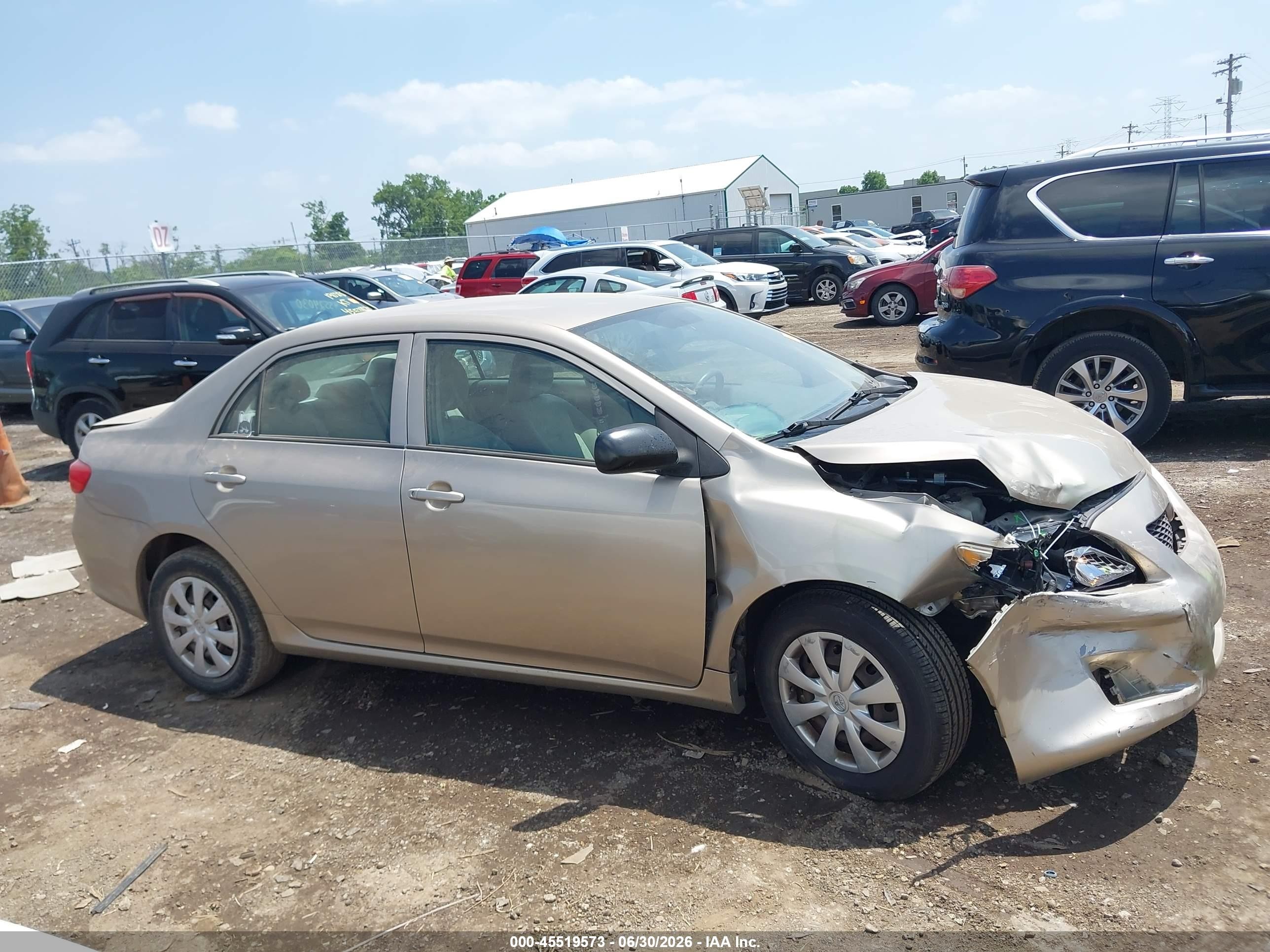 2009 Toyota Corolla   Tan vin: 1NXBU40E99Z033614