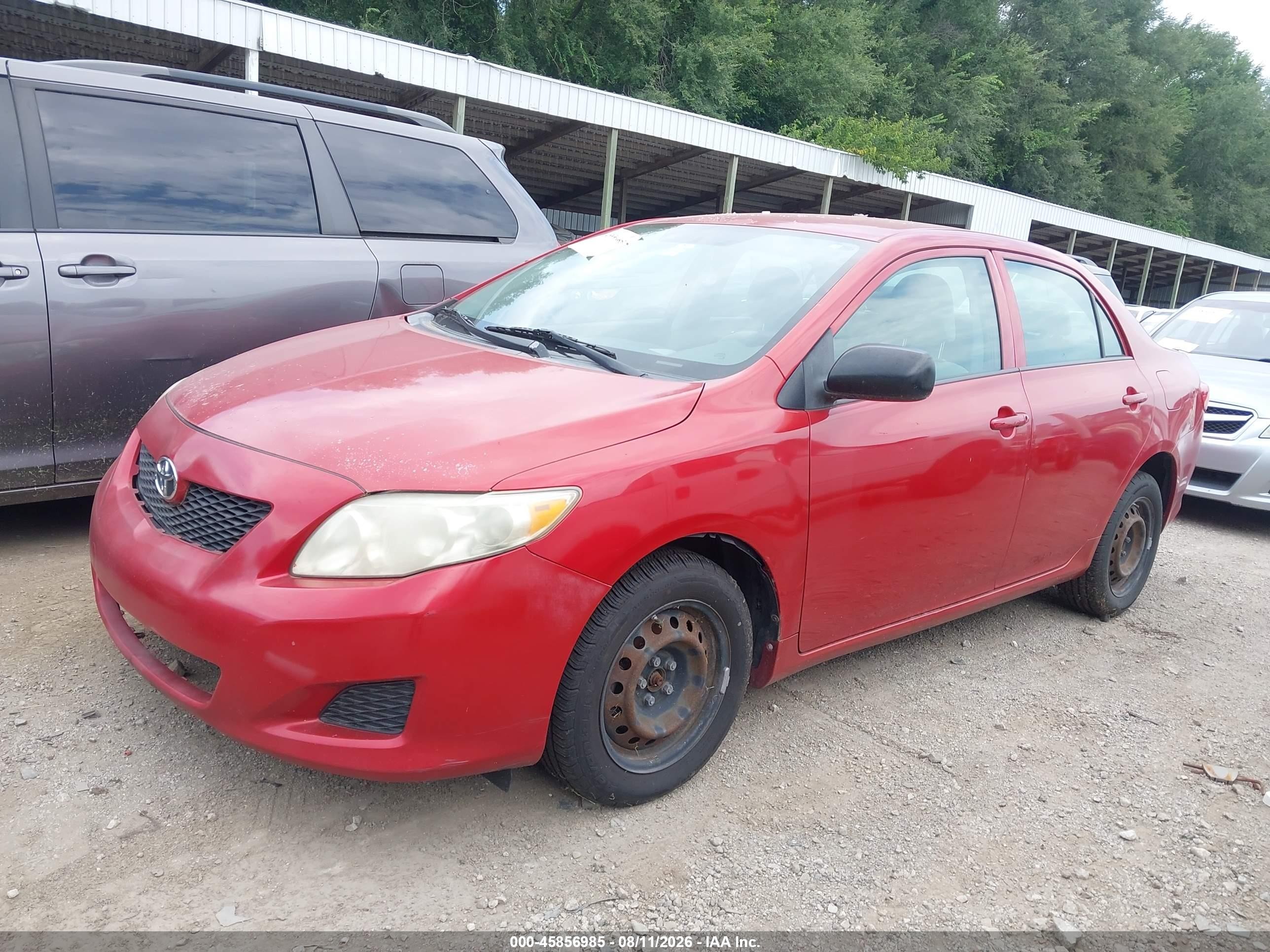 2009 Toyota Corolla   Red vin: 1NXBU40E99Z035119