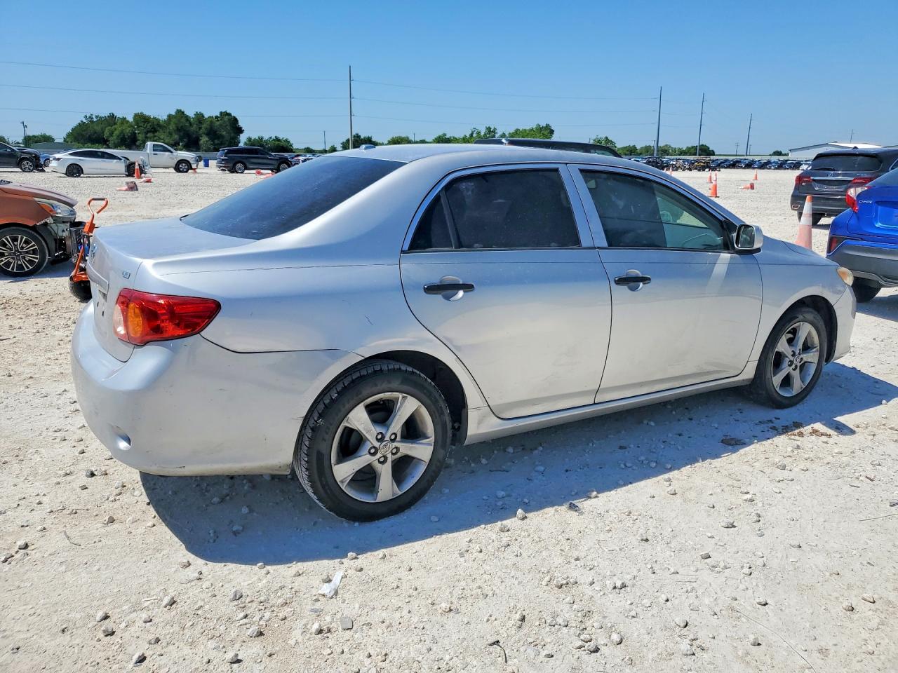 2009 Toyota Corolla Le Silver vin: 1NXBU40E99Z102091