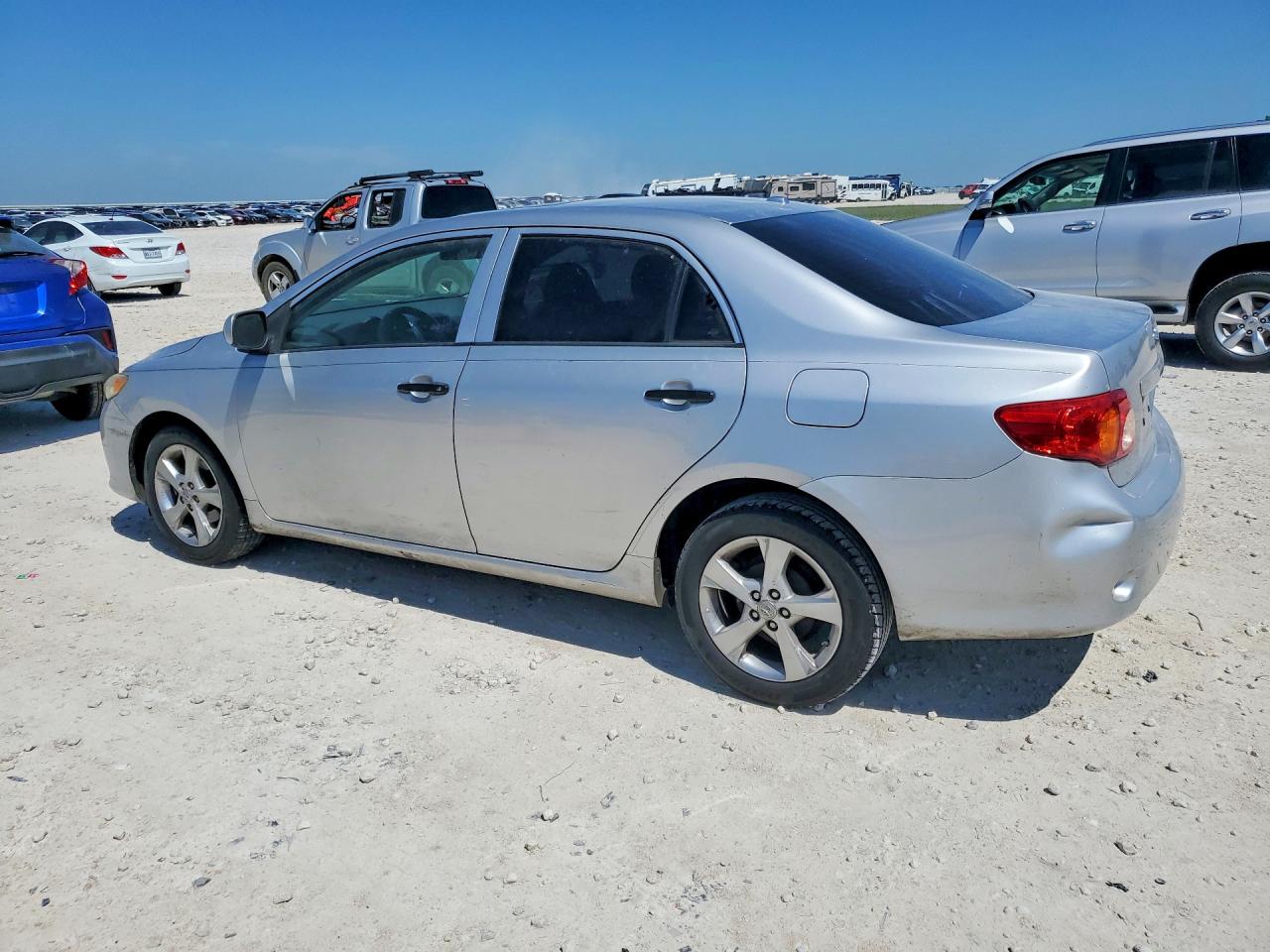 2009 Toyota Corolla Le Silver vin: 1NXBU40E99Z102091