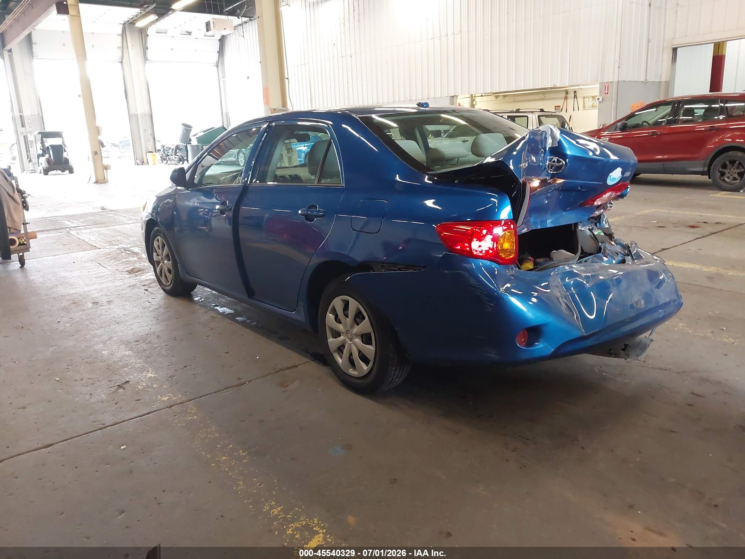 2009 Toyota Corolla Le Blue vin: 1NXBU40E99Z120820