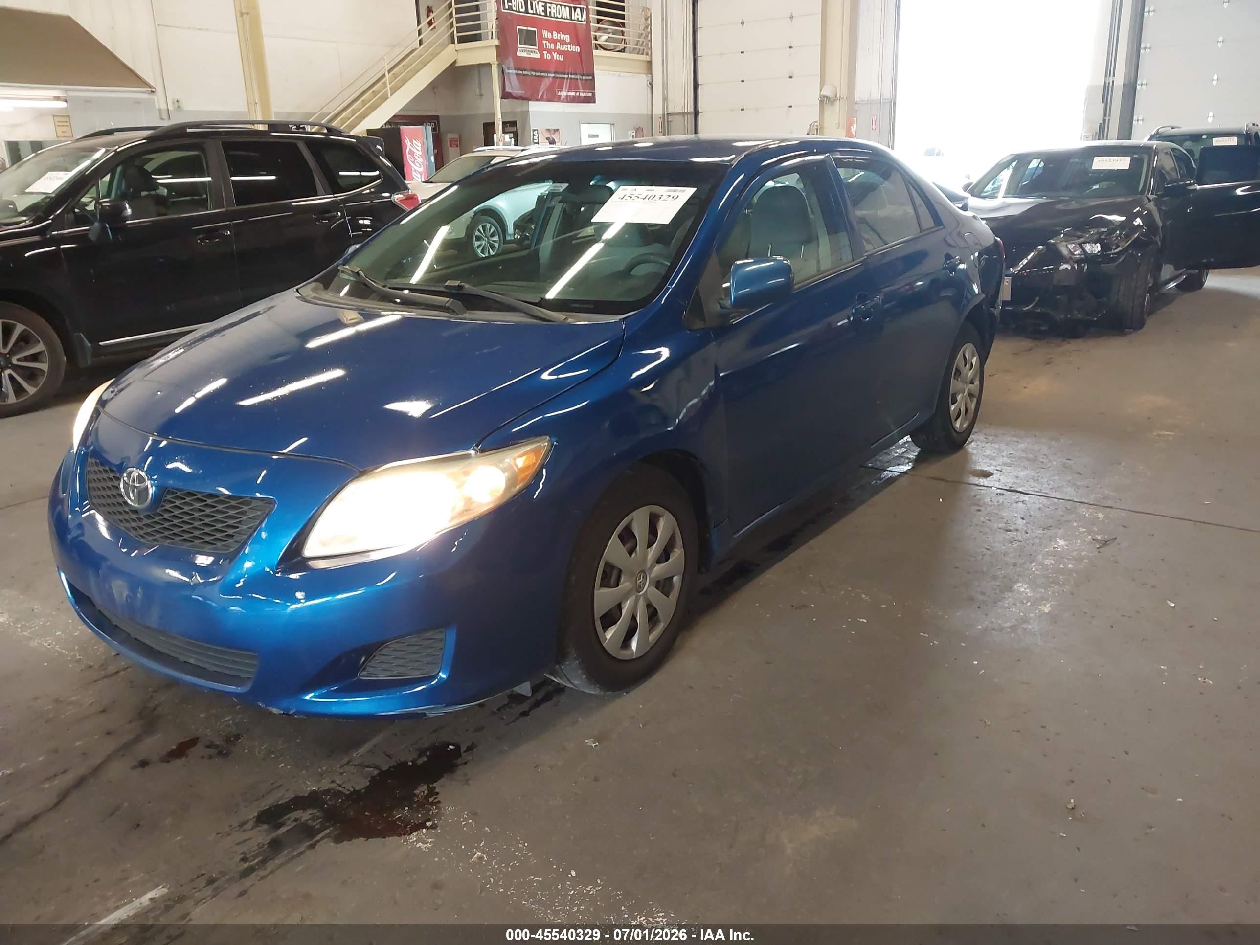 2009 Toyota Corolla Le Blue vin: 1NXBU40E99Z120820