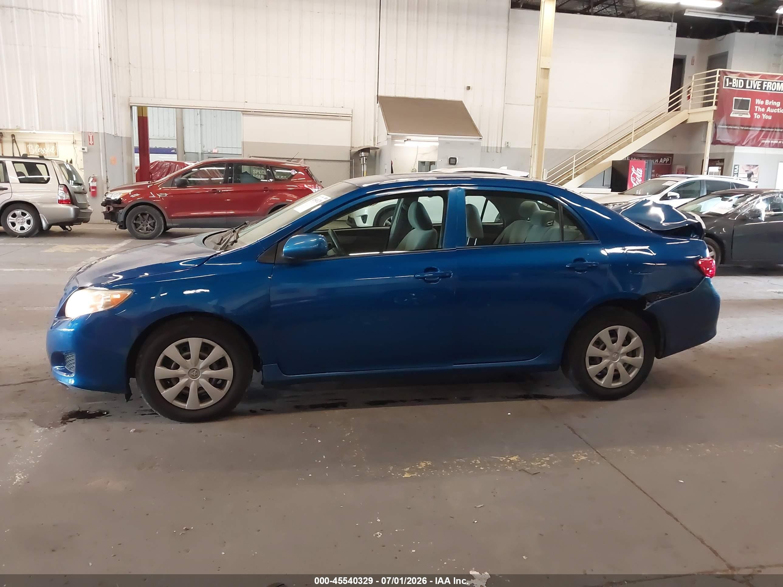 2009 Toyota Corolla Le Blue vin: 1NXBU40E99Z120820