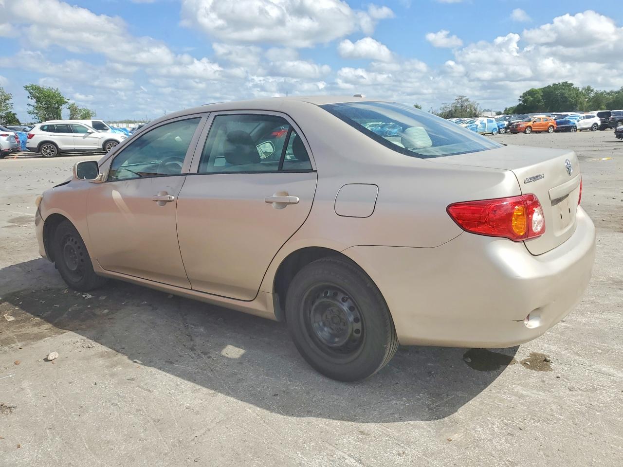 2009 Toyota Corolla Le Tan vin: 1NXBU40E99Z144972