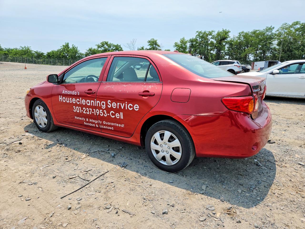 2009 Toyota Corolla Le Red vin: 1NXBU40E99Z153073
