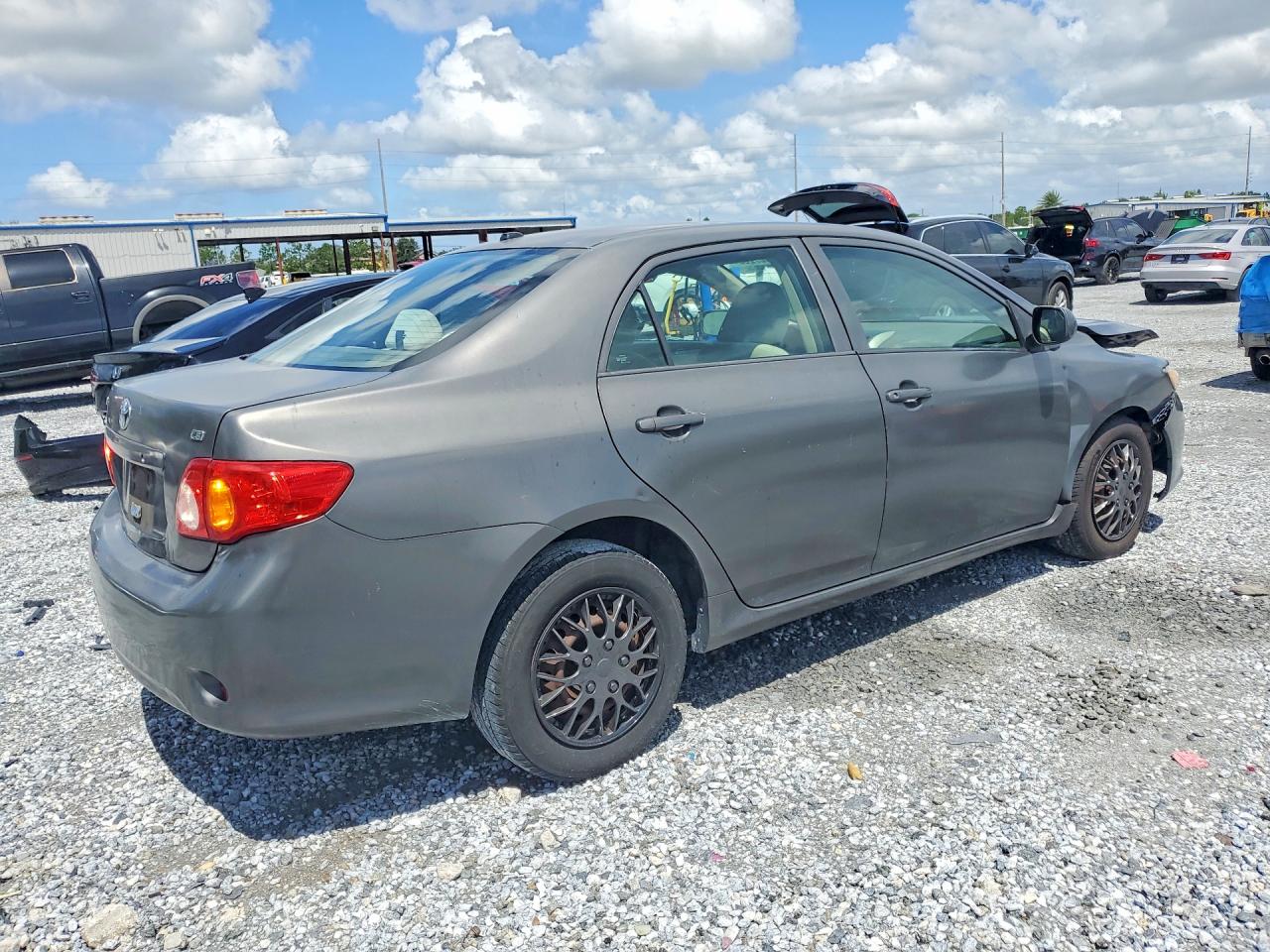2009 Toyota Corolla Le Gray vin: 1NXBU40EX9Z055430