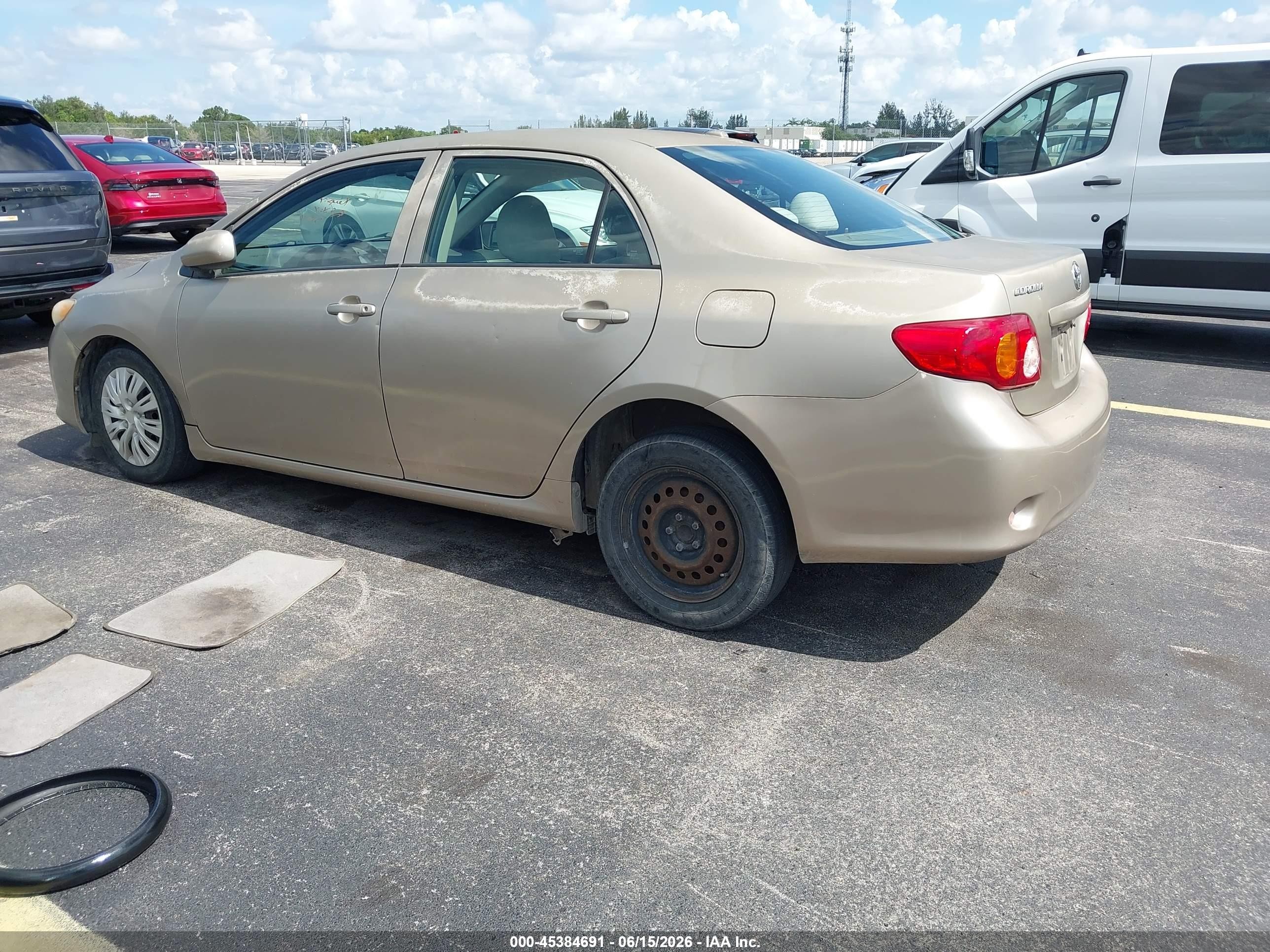 2009 Toyota Corolla Le Gold vin: 1NXBU40EX9Z077525