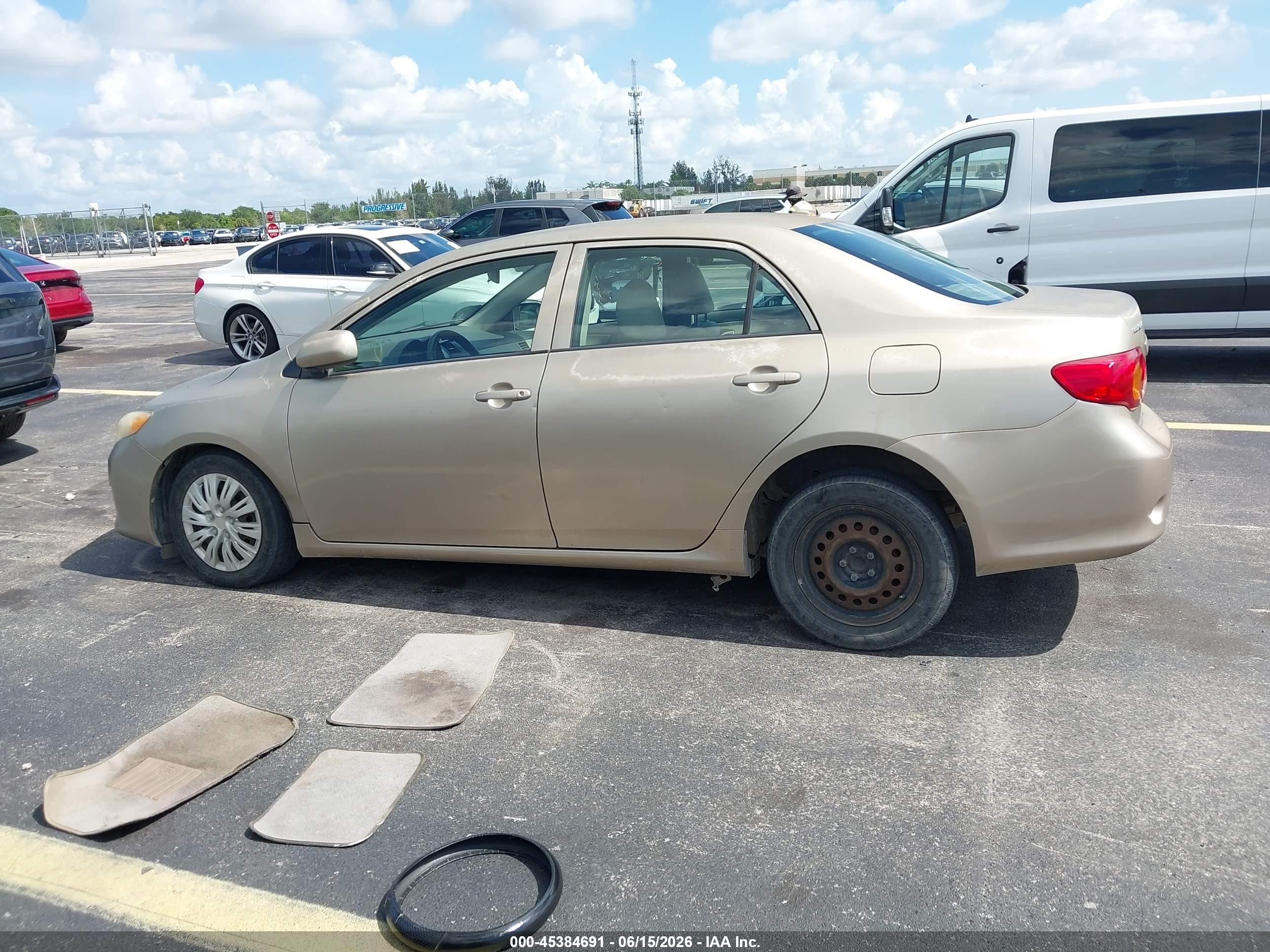 2009 Toyota Corolla Le Gold vin: 1NXBU40EX9Z077525