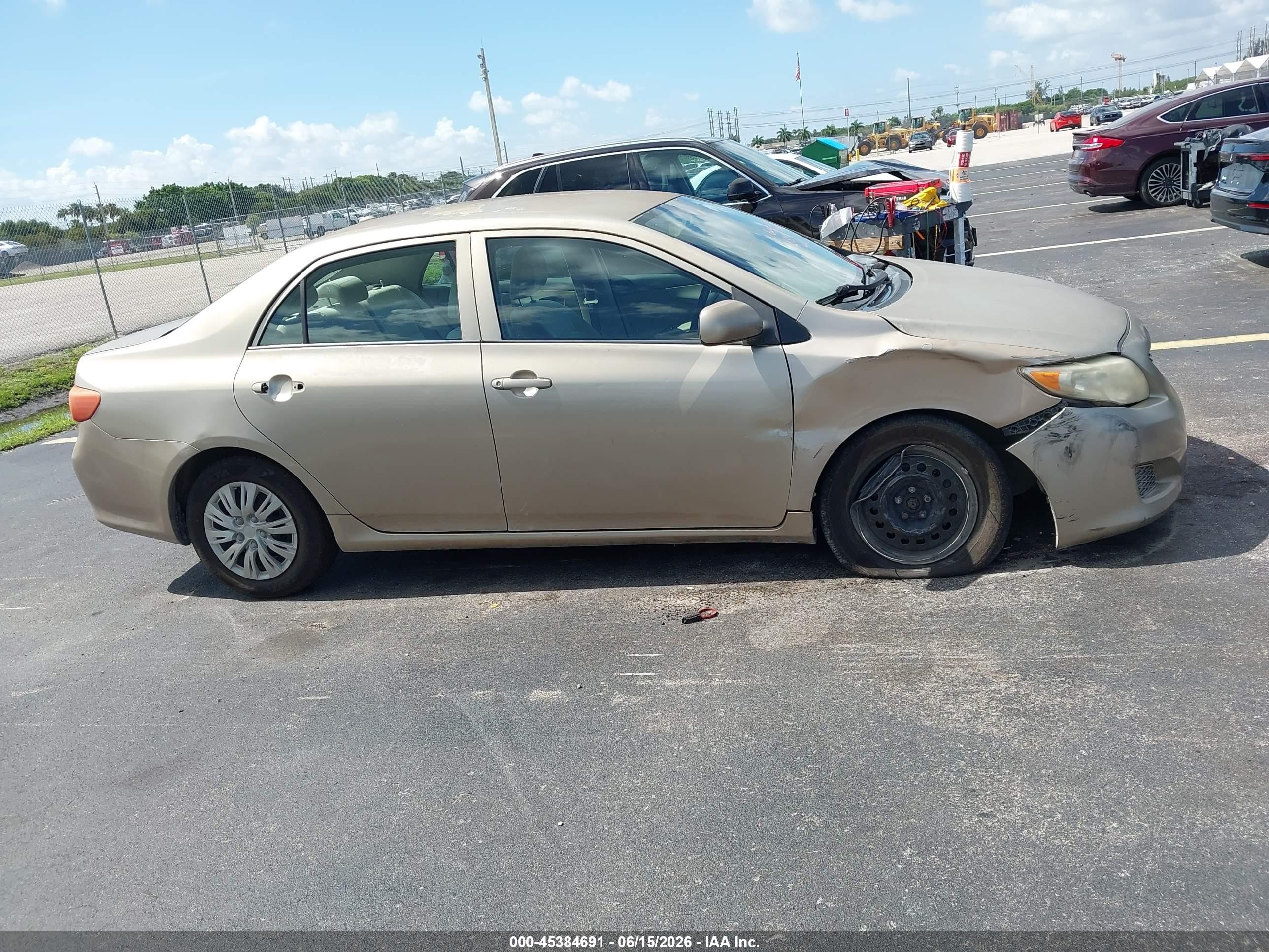 2009 Toyota Corolla Le Gold vin: 1NXBU40EX9Z077525