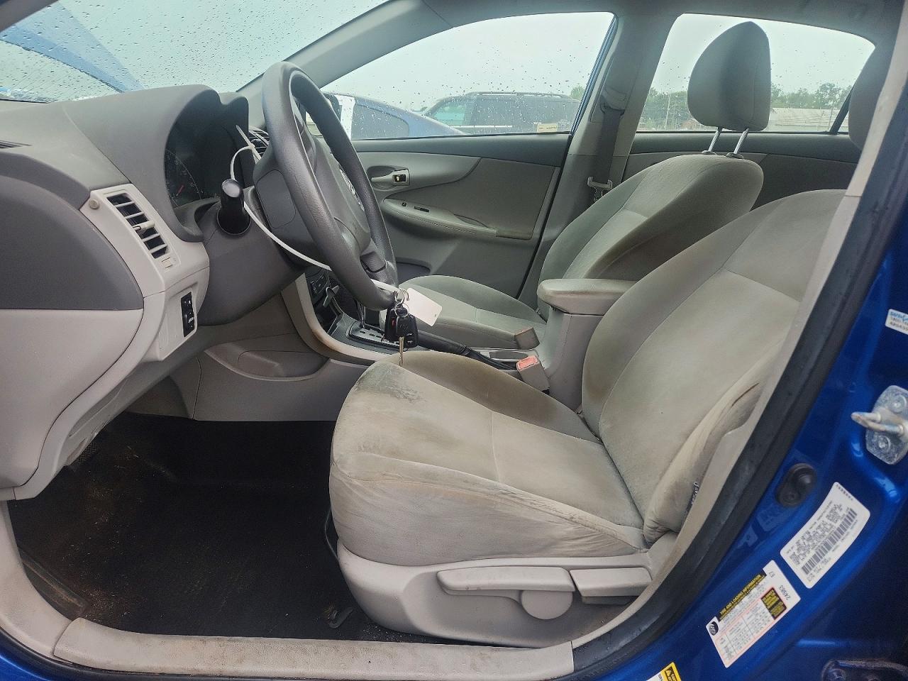 2009 Toyota Corolla Le Blue vin: 1NXBU40EX9Z085477