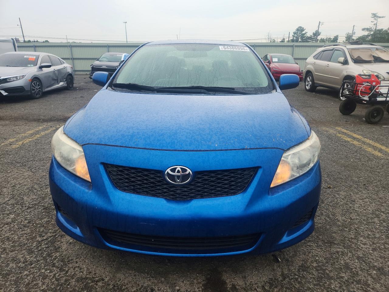 2009 Toyota Corolla Le Blue vin: 1NXBU40EX9Z085477