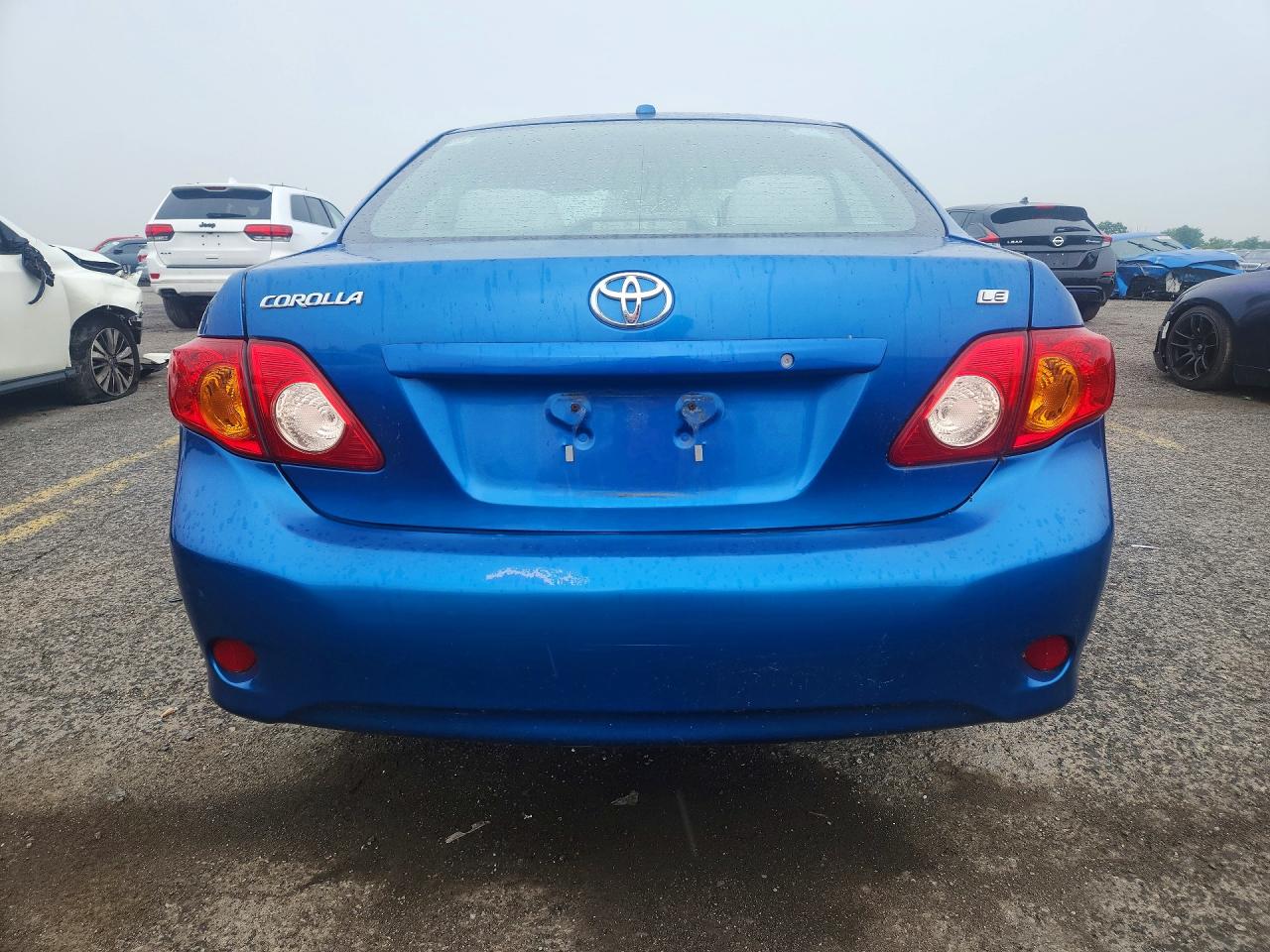2009 Toyota Corolla Le Blue vin: 1NXBU40EX9Z085477