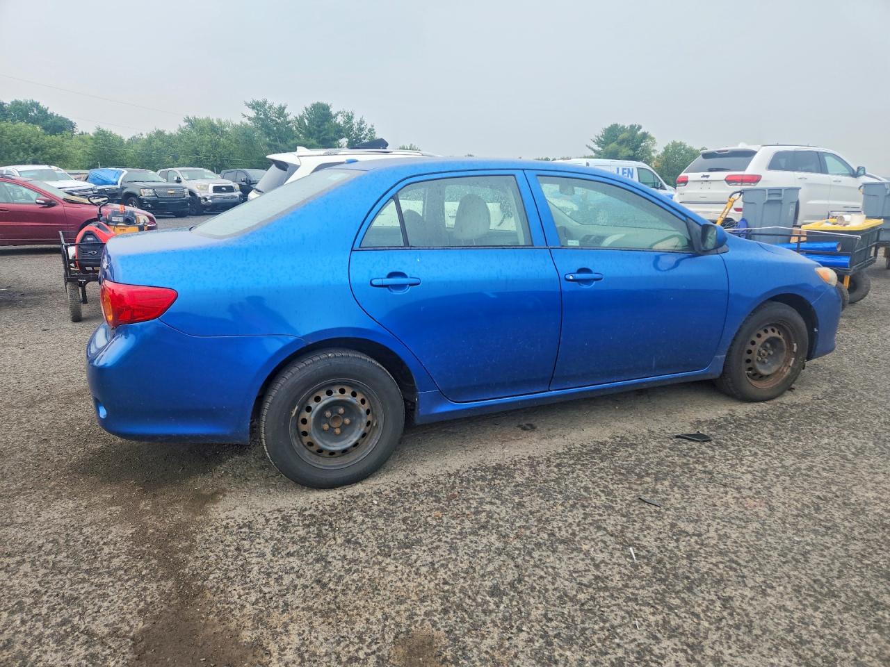 2009 Toyota Corolla Le Blue vin: 1NXBU40EX9Z085477