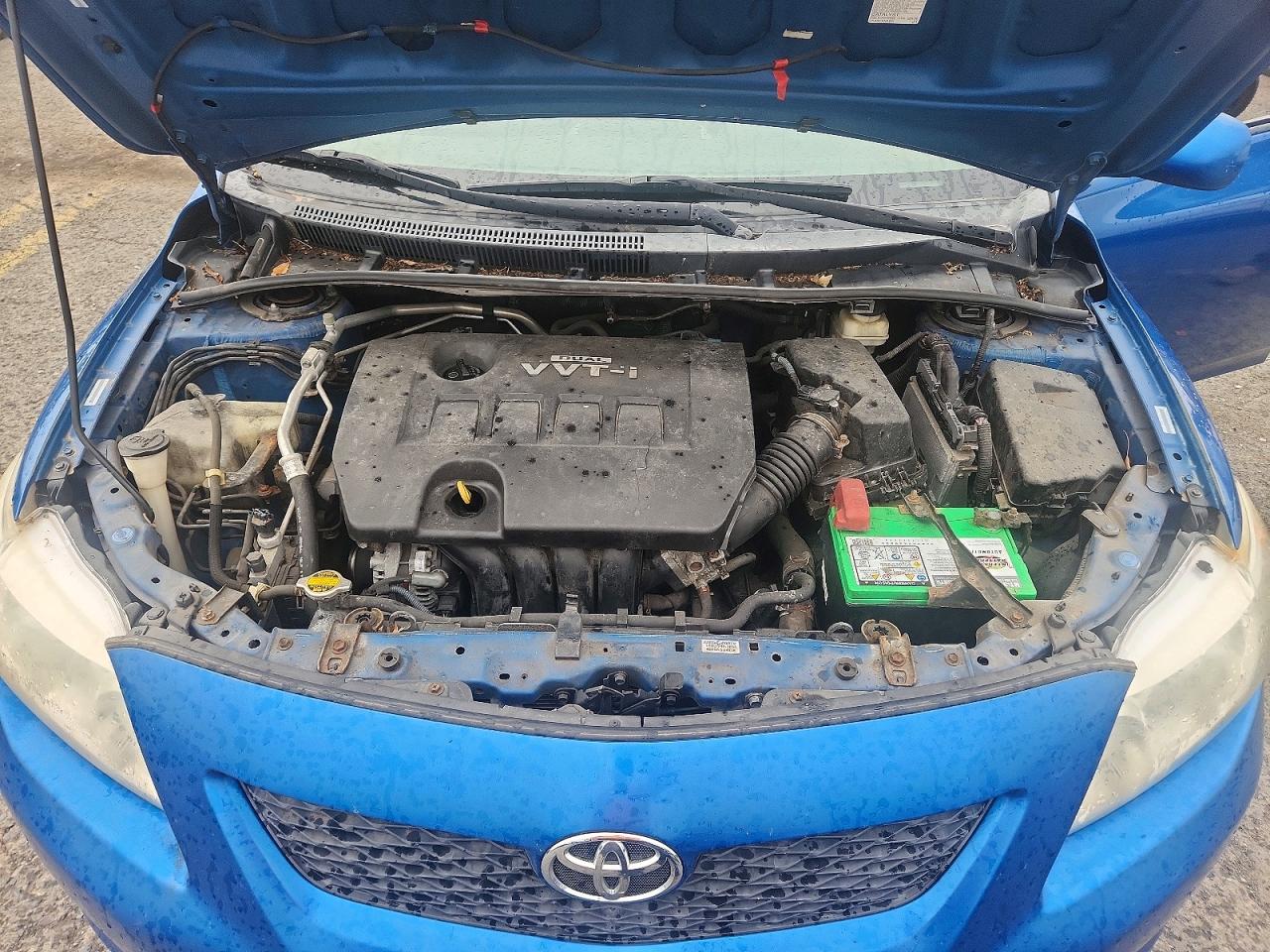 2009 Toyota Corolla Le Blue vin: 1NXBU40EX9Z085477
