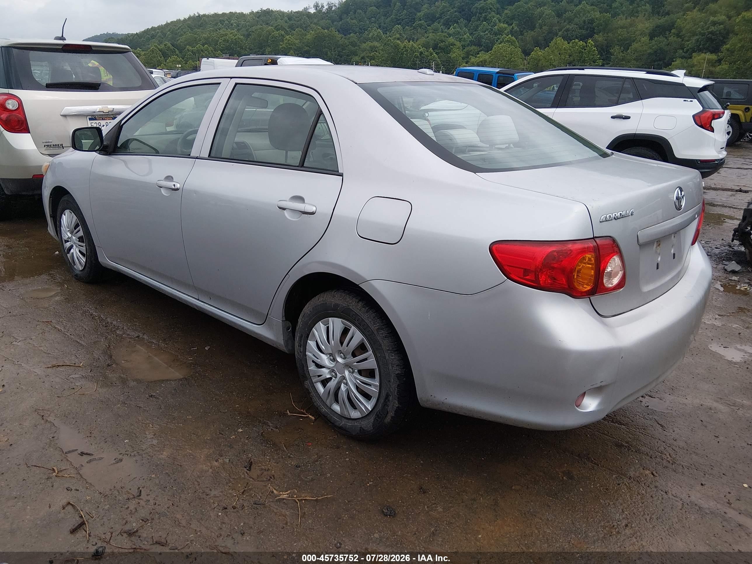 2009 Toyota Corolla Le Silver vin: 1NXBU40EX9Z090341