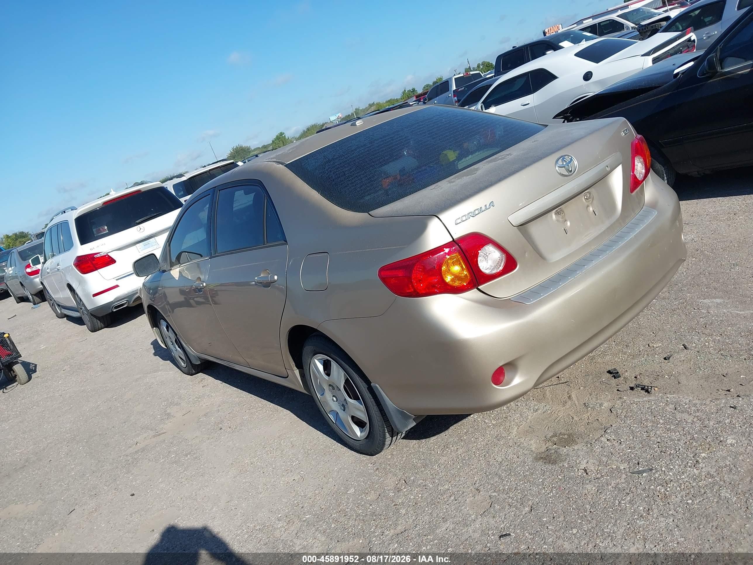 2009 Toyota Corolla Xle Золотой vin: 1NXBU40EX9Z097757