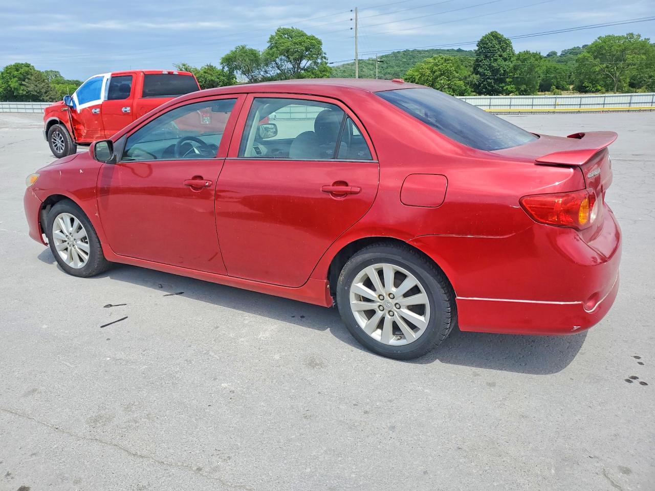 2009 Toyota Corolla Le Red vin: 1NXBU40EX9Z111639