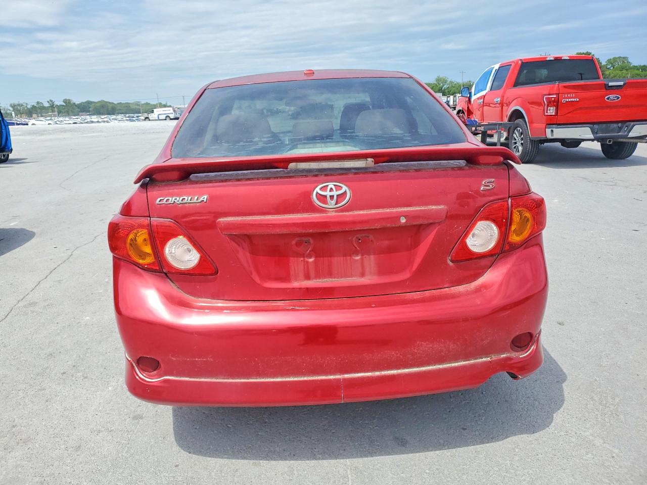 2009 Toyota Corolla Le Red vin: 1NXBU40EX9Z111639