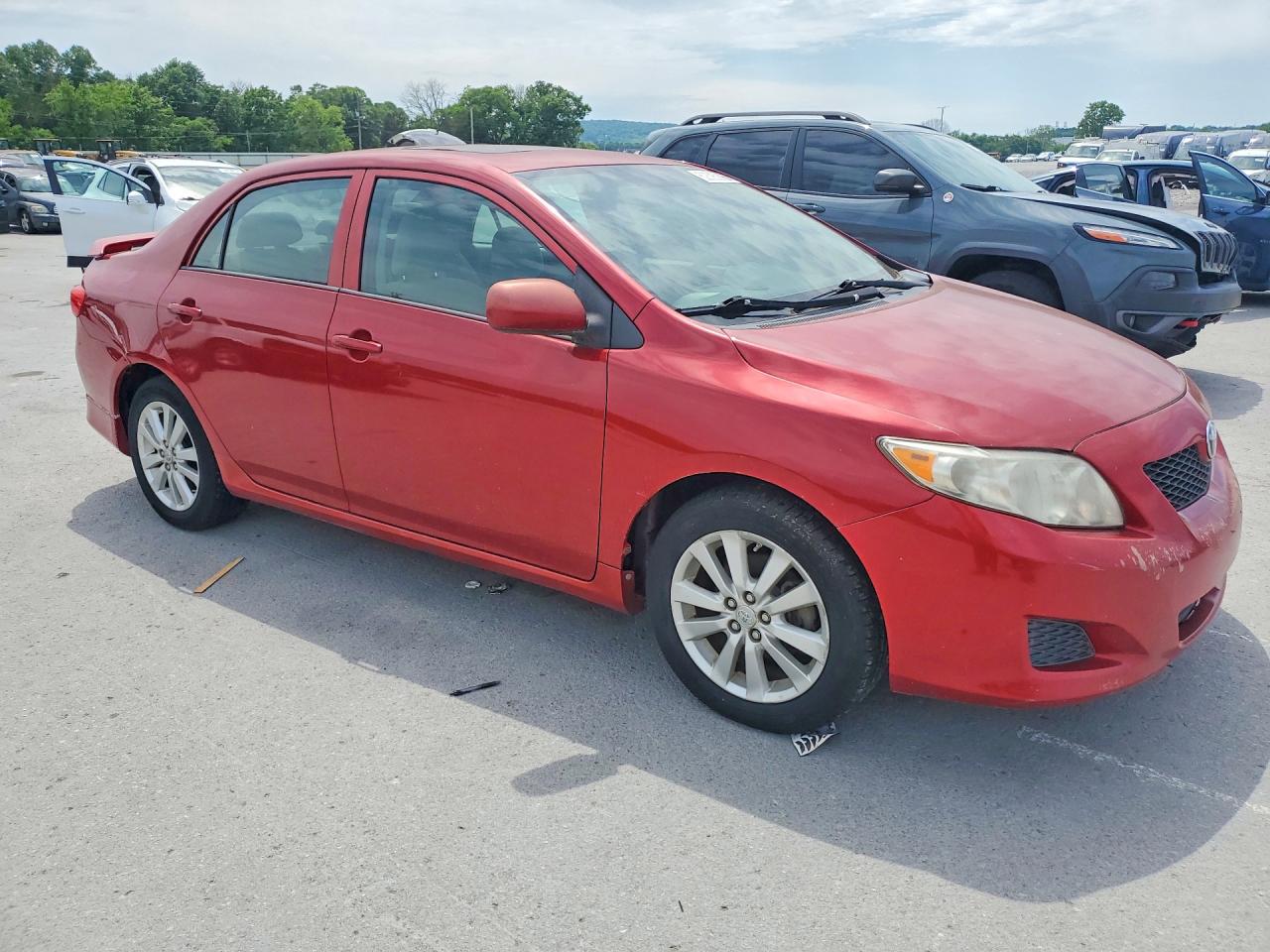 2009 Toyota Corolla Le Red vin: 1NXBU40EX9Z111639