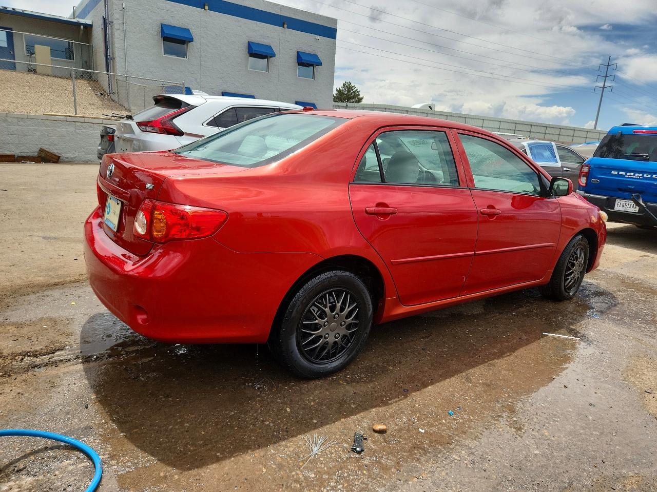 2009 Toyota Corolla Le Red vin: 1NXBU40EX9Z128781