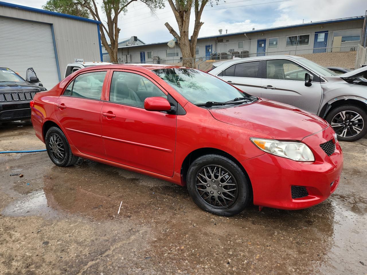 2009 Toyota Corolla Le Red vin: 1NXBU40EX9Z128781 Damage: Right Front Door, Dent(S) W/ Paint Dmg, 1 To 2 Inches