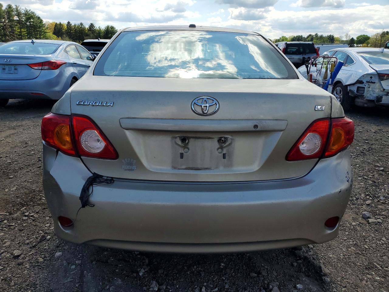 2009 Toyota Corolla Le Beige vin: 1NXBU40EX9Z130823