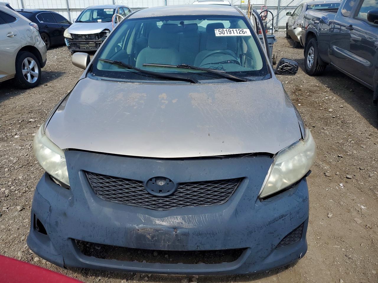 2009 Toyota Corolla Le Beige vin: 1NXBU40EX9Z130823