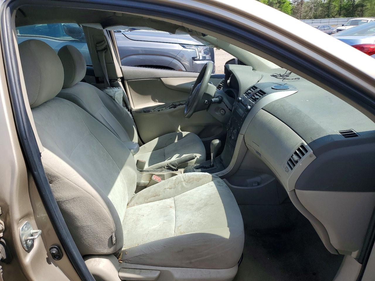 2009 Toyota Corolla Le Beige vin: 1NXBU40EX9Z130823