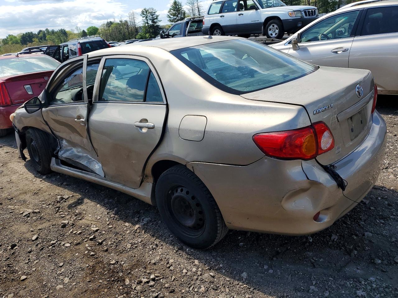 2009 Toyota Corolla Le Beige vin: 1NXBU40EX9Z130823