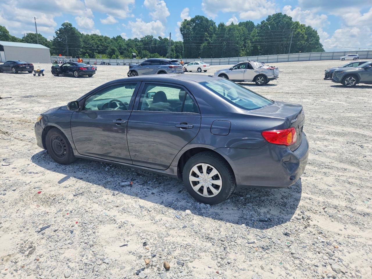 2009 Toyota Corolla Le Black vin: 1NXBU40EX9Z138680