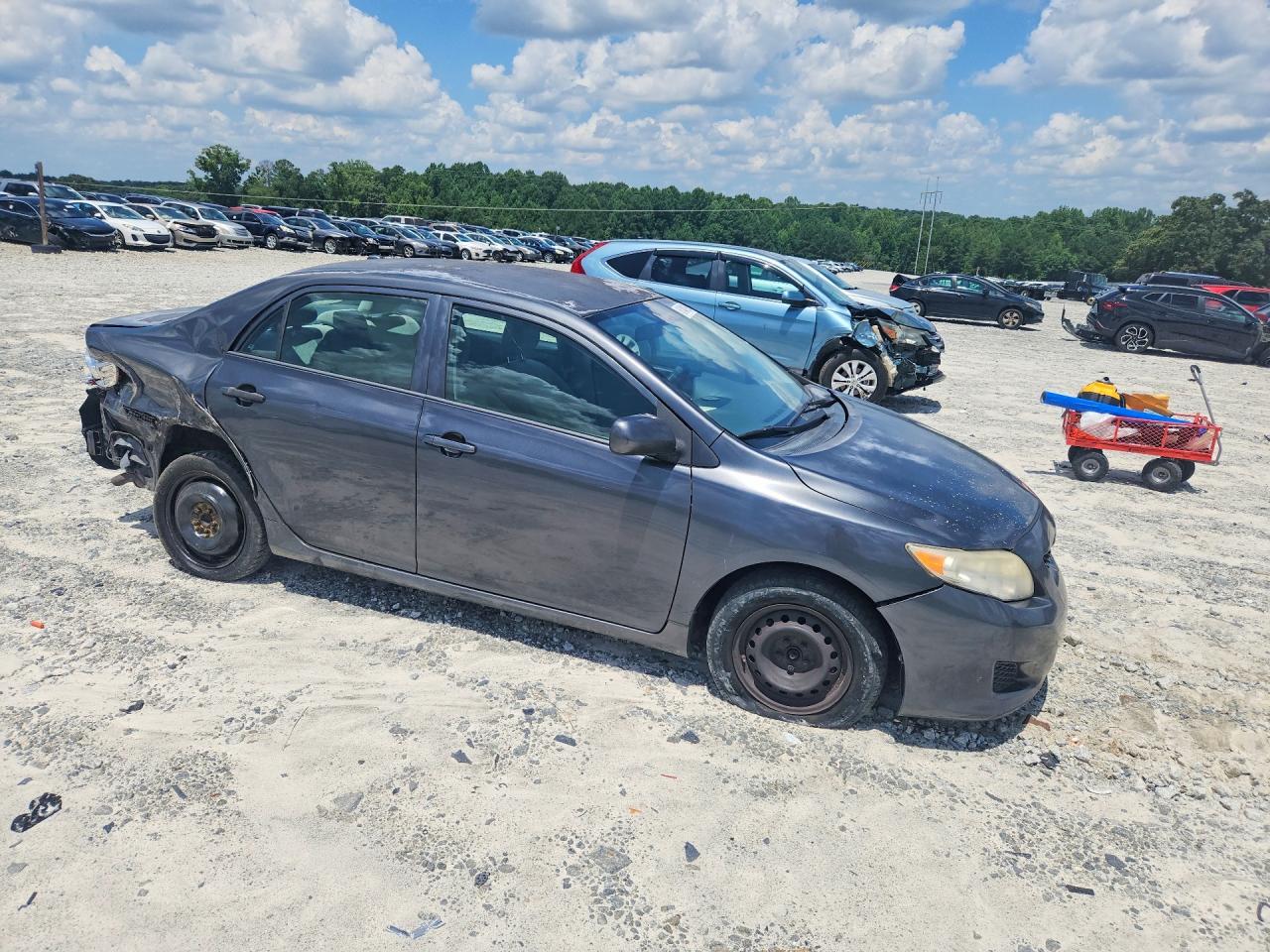 2009 Toyota Corolla Le Black vin: 1NXBU40EX9Z138680