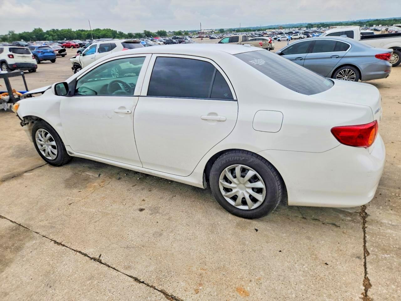 2009 Toyota Corolla Le White vin: 1NXBU40EX9Z140672