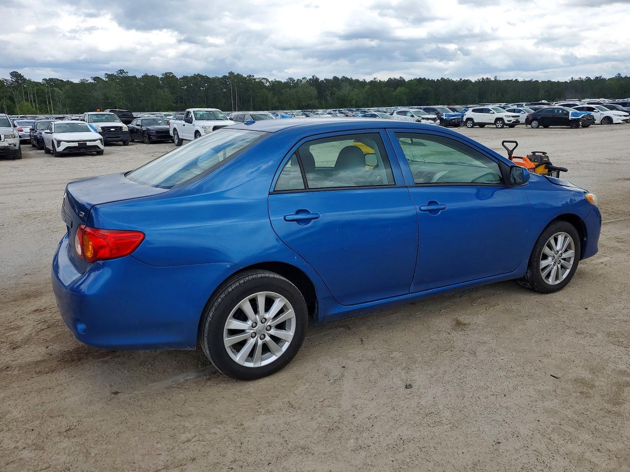 2009 Toyota Corolla Base Blue vin: 1NXBU40EX9Z141403
