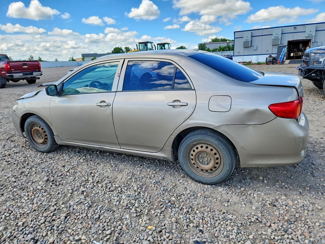 2009 Toyota Corolla Le Gold vin: 1NXBU40EX9Z143443