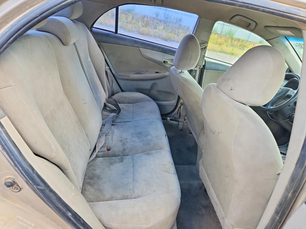 2009 Toyota Corolla Le Gold vin: 1NXBU40EX9Z143443