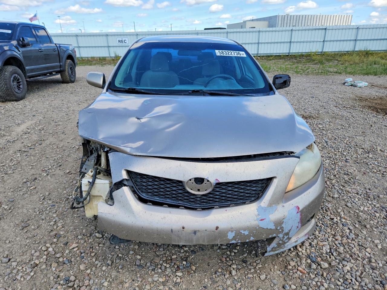 2009 Toyota Corolla Le Gold vin: 1NXBU40EX9Z143443