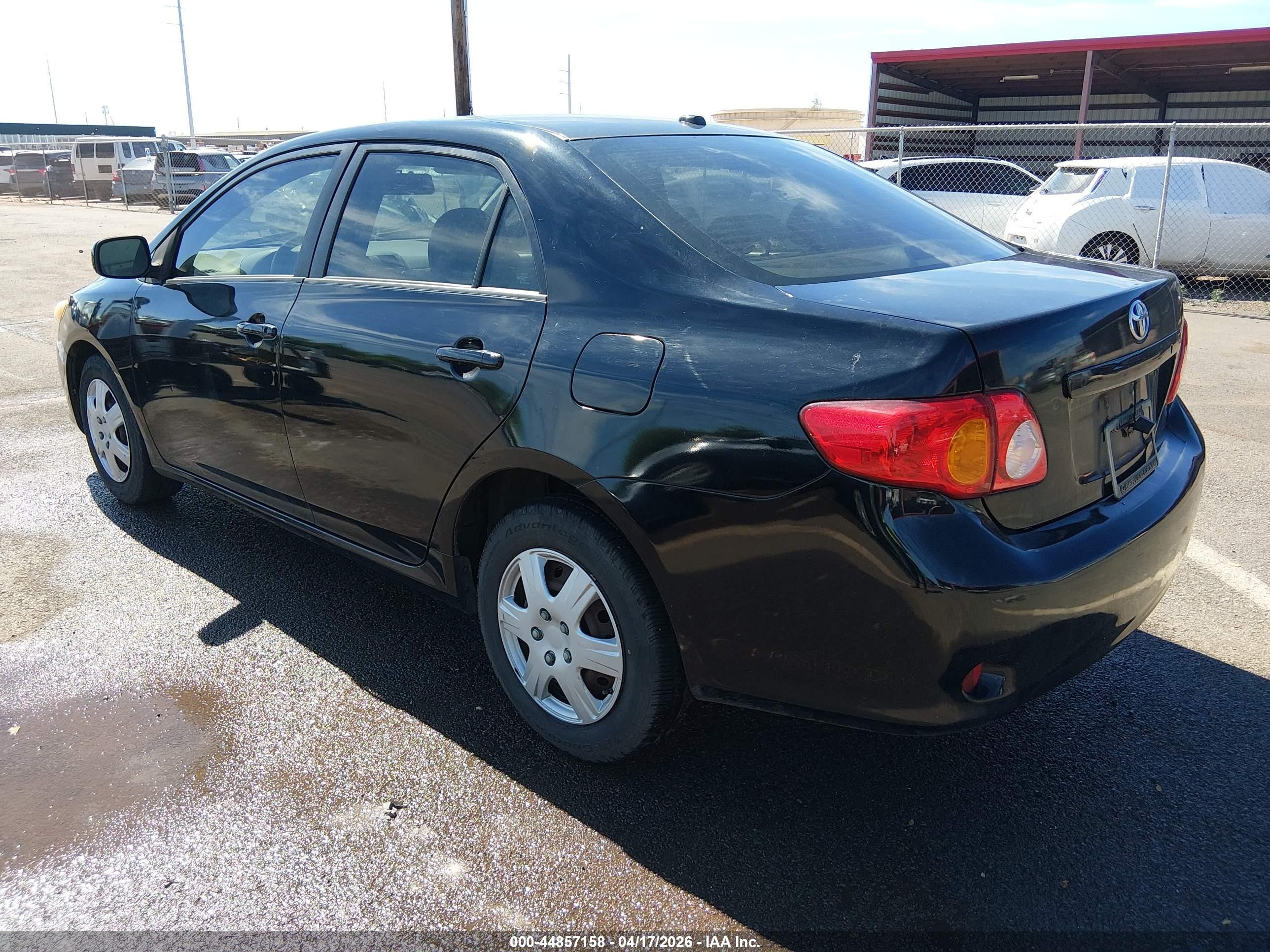 2009 Toyota Corolla Le Black vin: 1NXBU40EX9Z143667