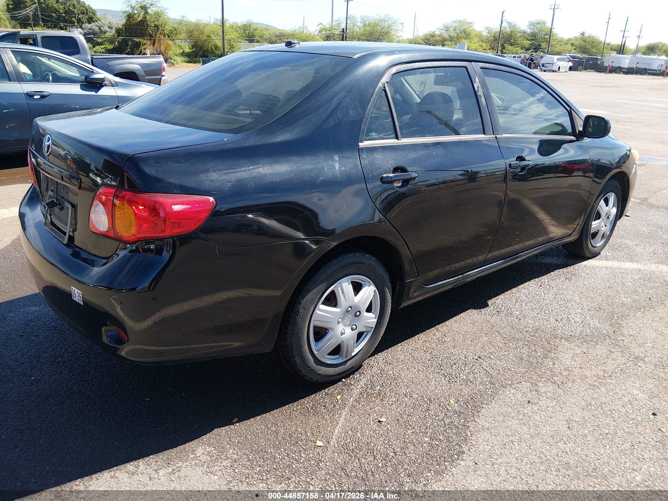 2009 Toyota Corolla Le Black vin: 1NXBU40EX9Z143667