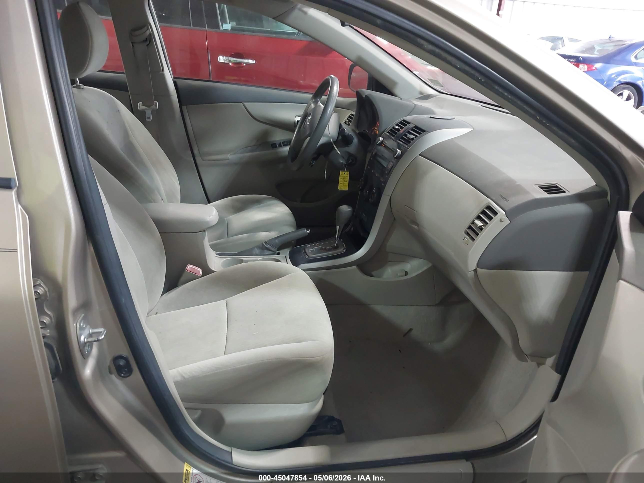 2010 Toyota Corolla Le Beige vin: 1NXBU4EE0AZ170714
