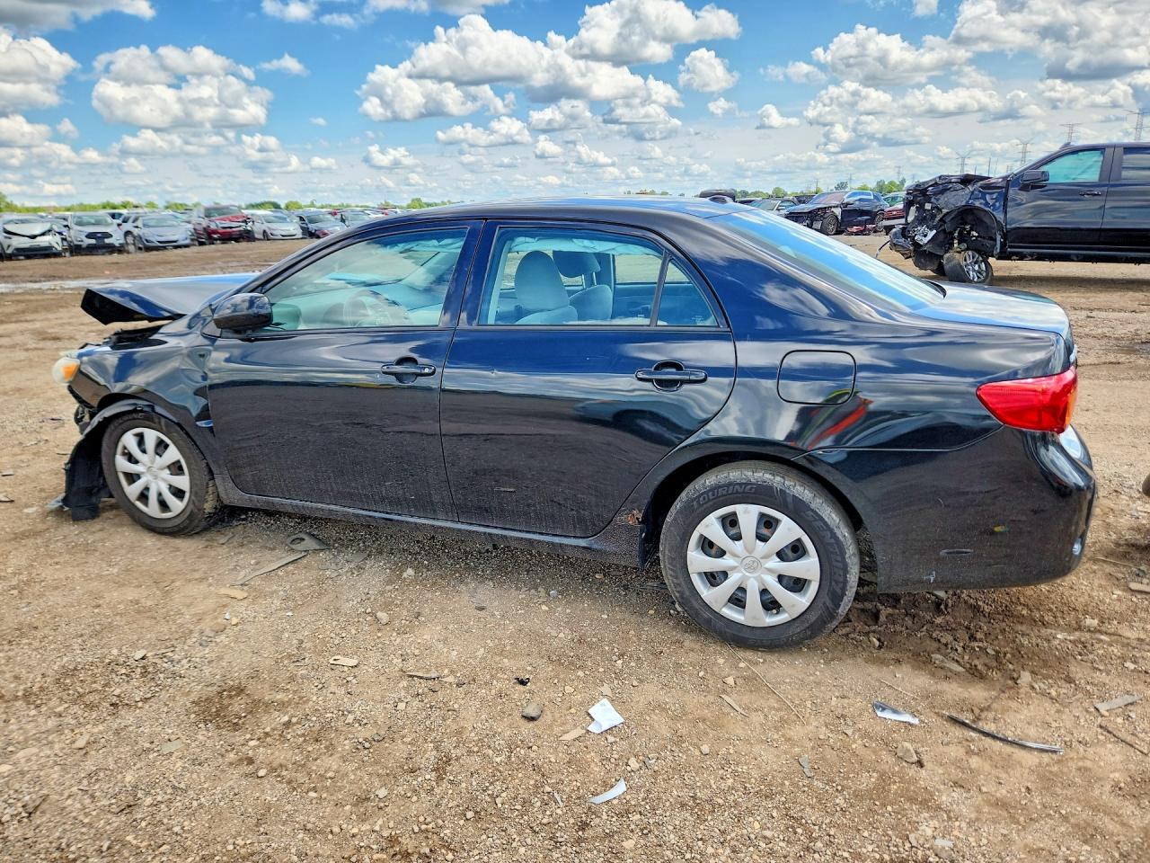 2010 Toyota Corolla Le Black vin: 1NXBU4EE0AZ313354