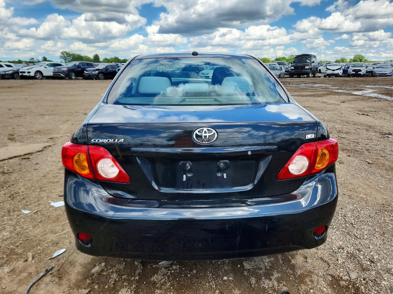 2010 Toyota Corolla Le Black vin: 1NXBU4EE0AZ313354