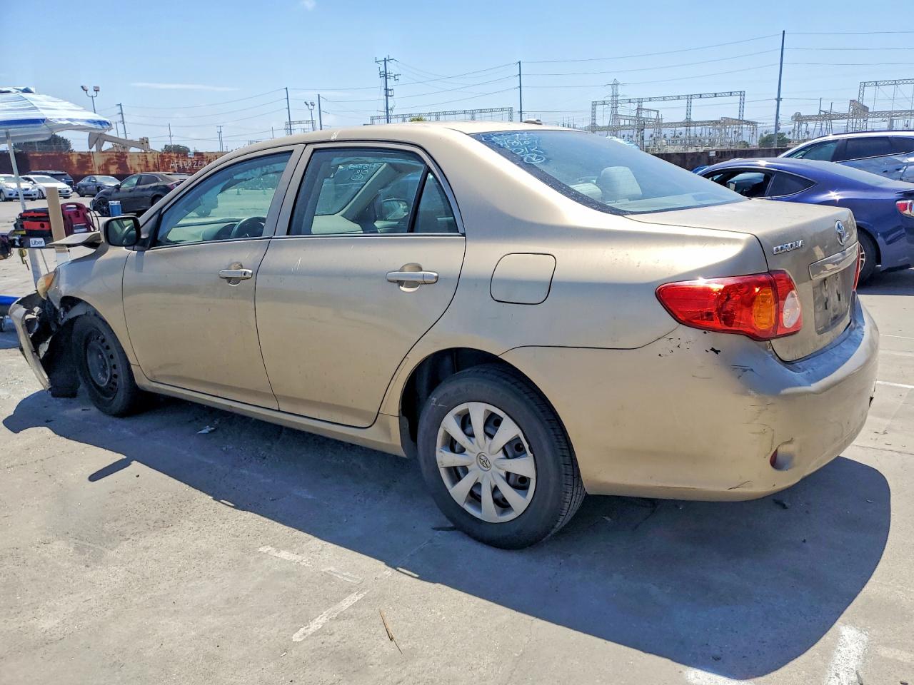 2010 Toyota Corolla Le Gold vin: 1NXBU4EE0AZ336763