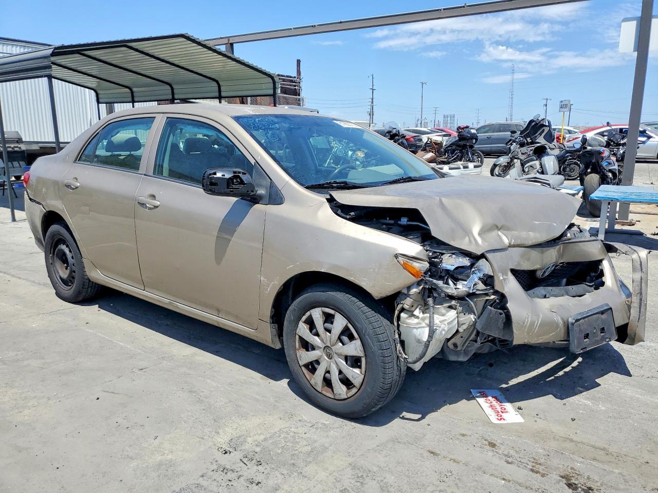 2010 Toyota Corolla Le Gold vin: 1NXBU4EE0AZ336763