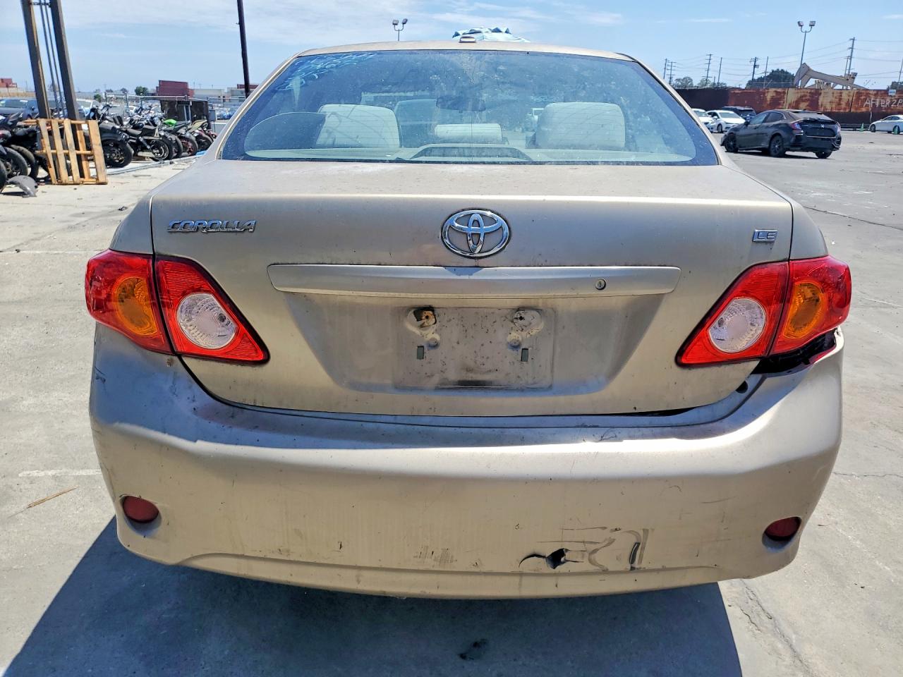 2010 Toyota Corolla Le Gold vin: 1NXBU4EE0AZ336763