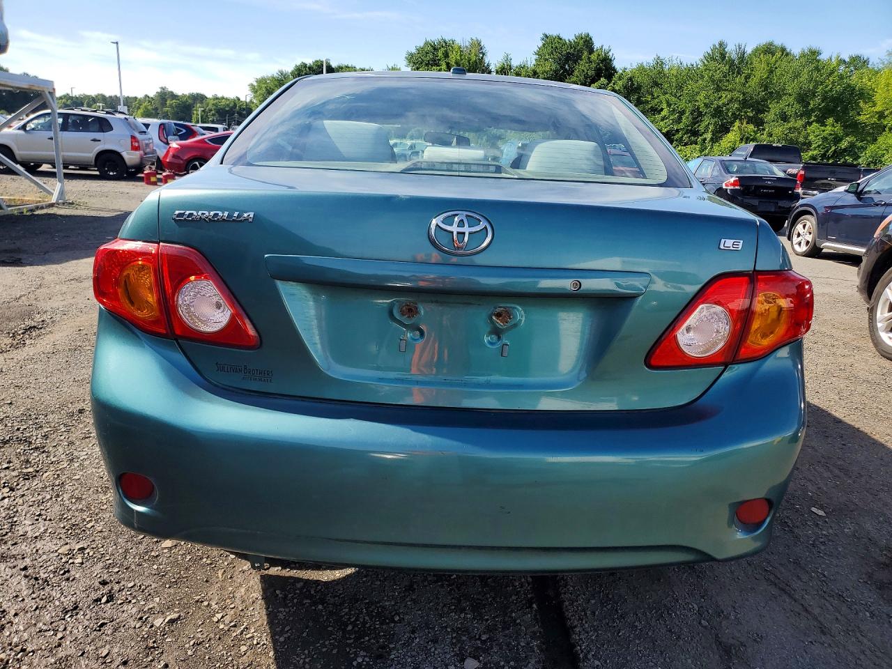 2010 Toyota Corolla Le Teal vin: 1NXBU4EE1AZ327862